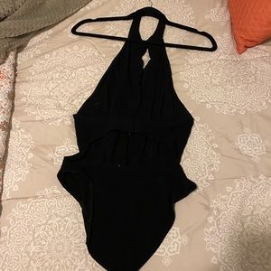 Free People buttoned body suit w/ collar neck.